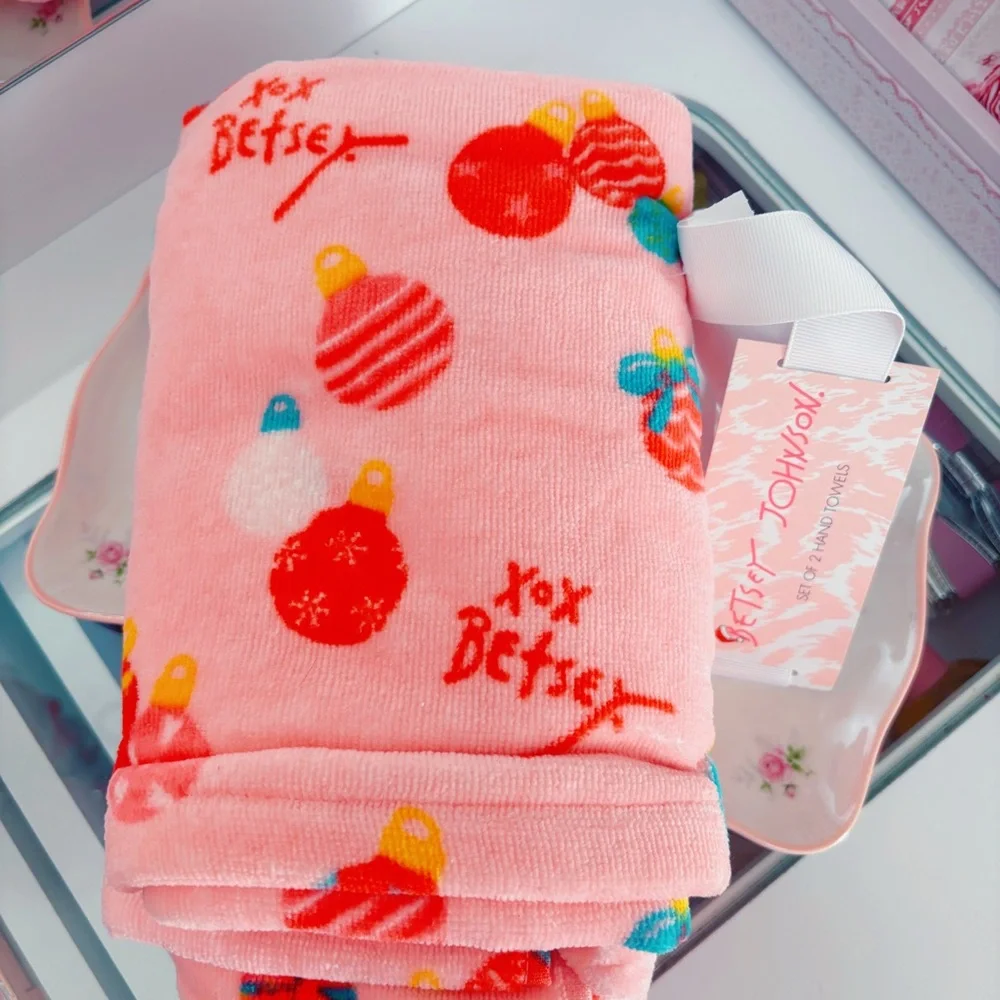 Betsey Johnson Pink hand towel with Red & white Ornament Print